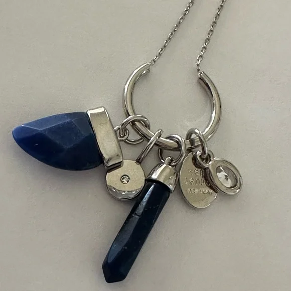 Henri Bendel  silver tone necklace with dark blue crystal and logo charms disc - Picture 7 of 9